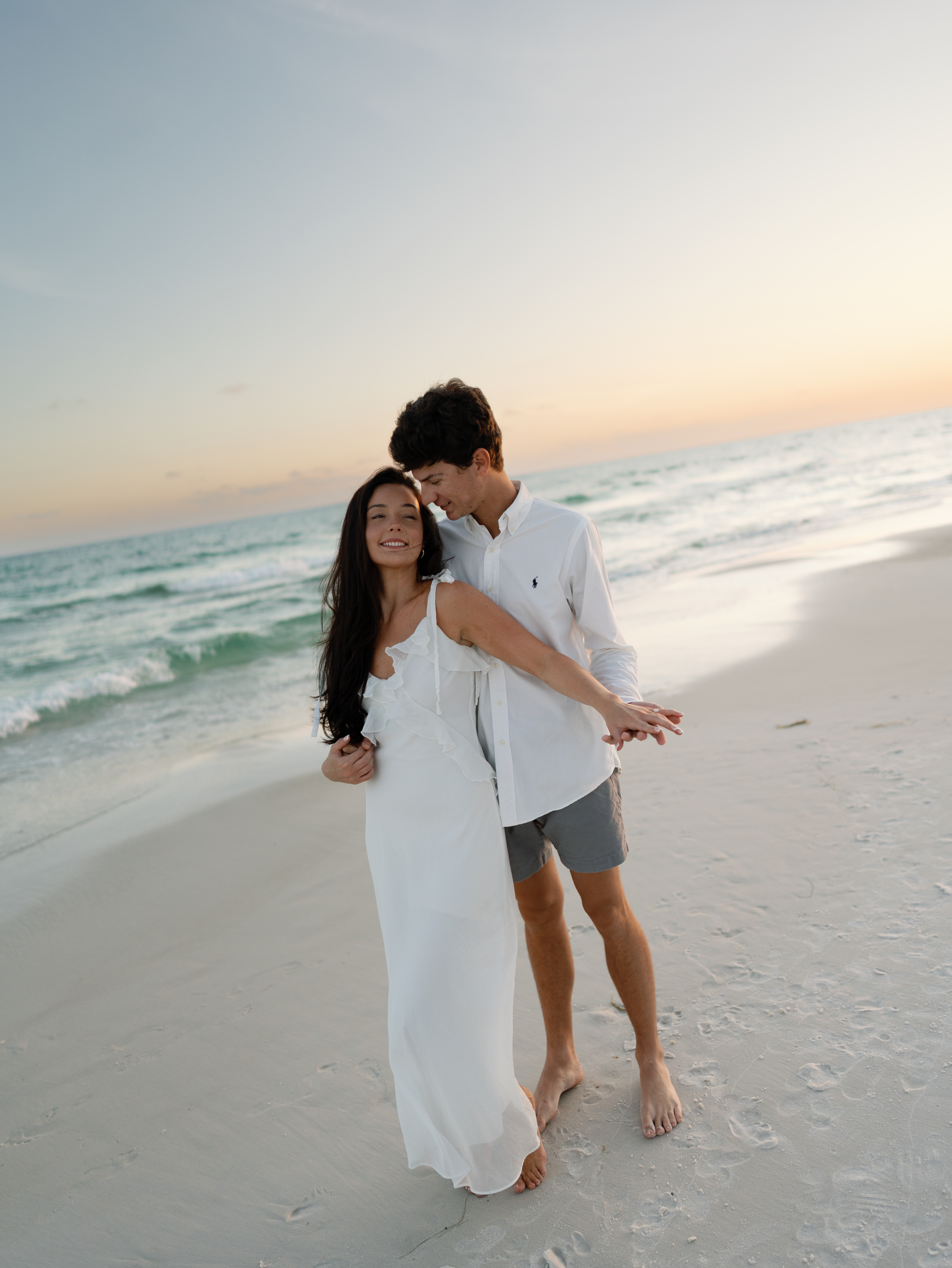 Couple at the beach for engagement session